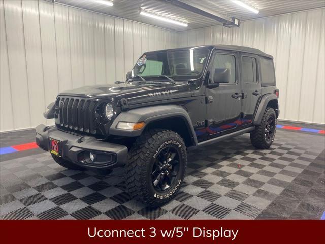 used 2021 Jeep Wrangler Unlimited car, priced at $31,555