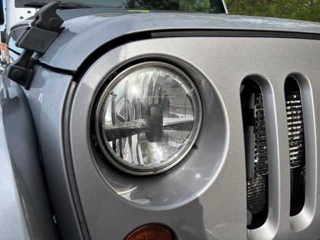 used 2013 Jeep Wrangler Unlimited car, priced at $15,812