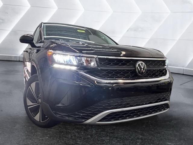 used 2024 Volkswagen Taos car, priced at $24,580