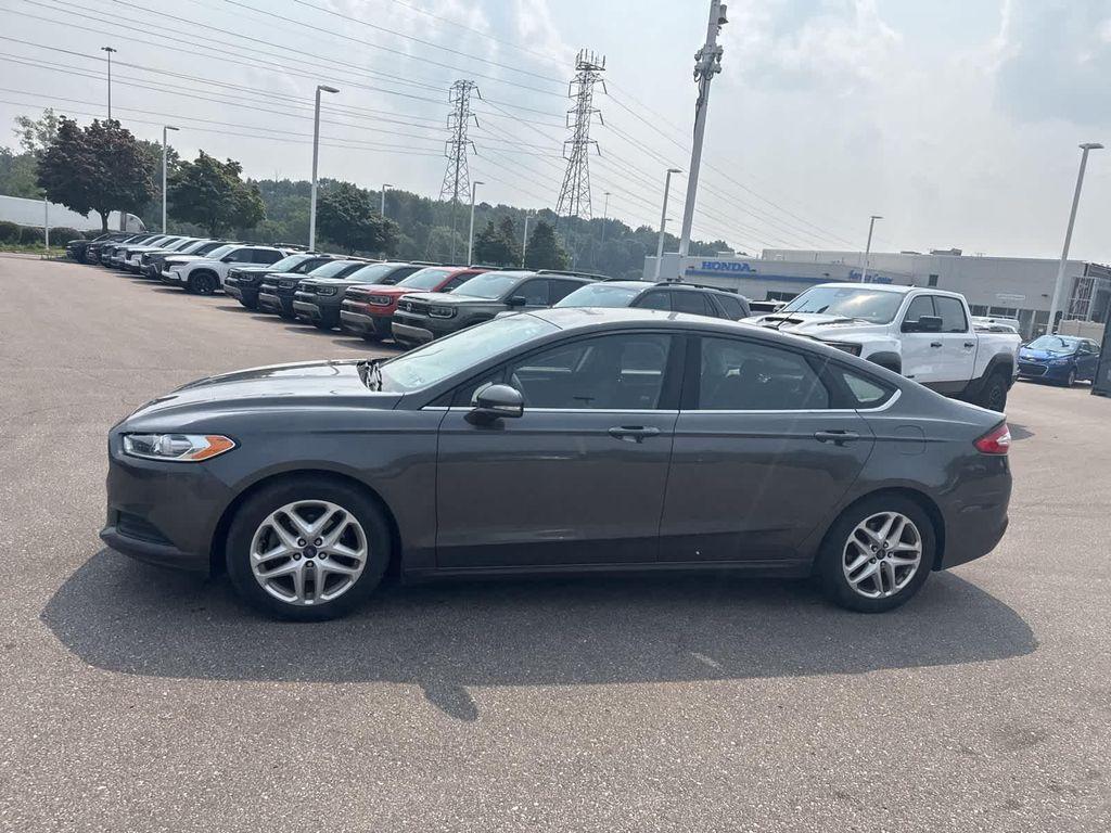 used 2015 Ford Fusion car, priced at $7,998