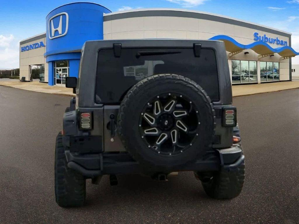 used 2016 Jeep Wrangler Unlimited car, priced at $18,091