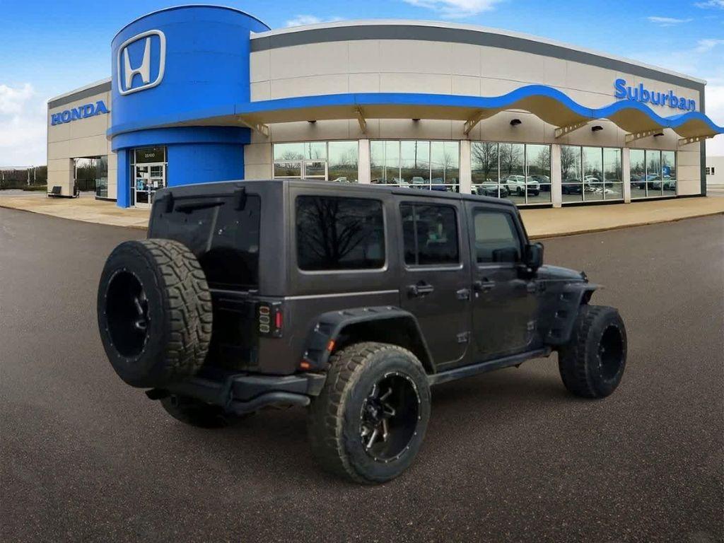 used 2016 Jeep Wrangler Unlimited car, priced at $18,091