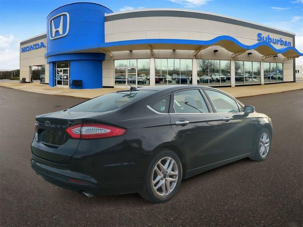 used 2014 Ford Fusion car, priced at $6,997