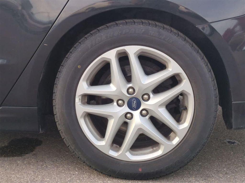 used 2014 Ford Fusion car, priced at $6,997