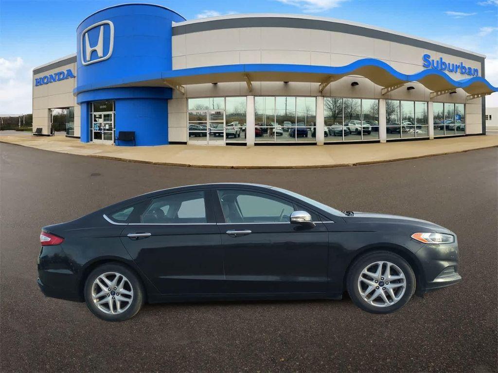 used 2014 Ford Fusion car, priced at $6,997