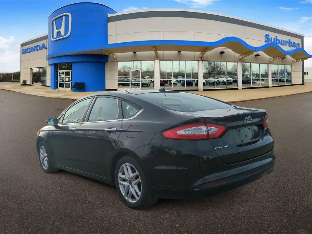 used 2014 Ford Fusion car, priced at $6,997