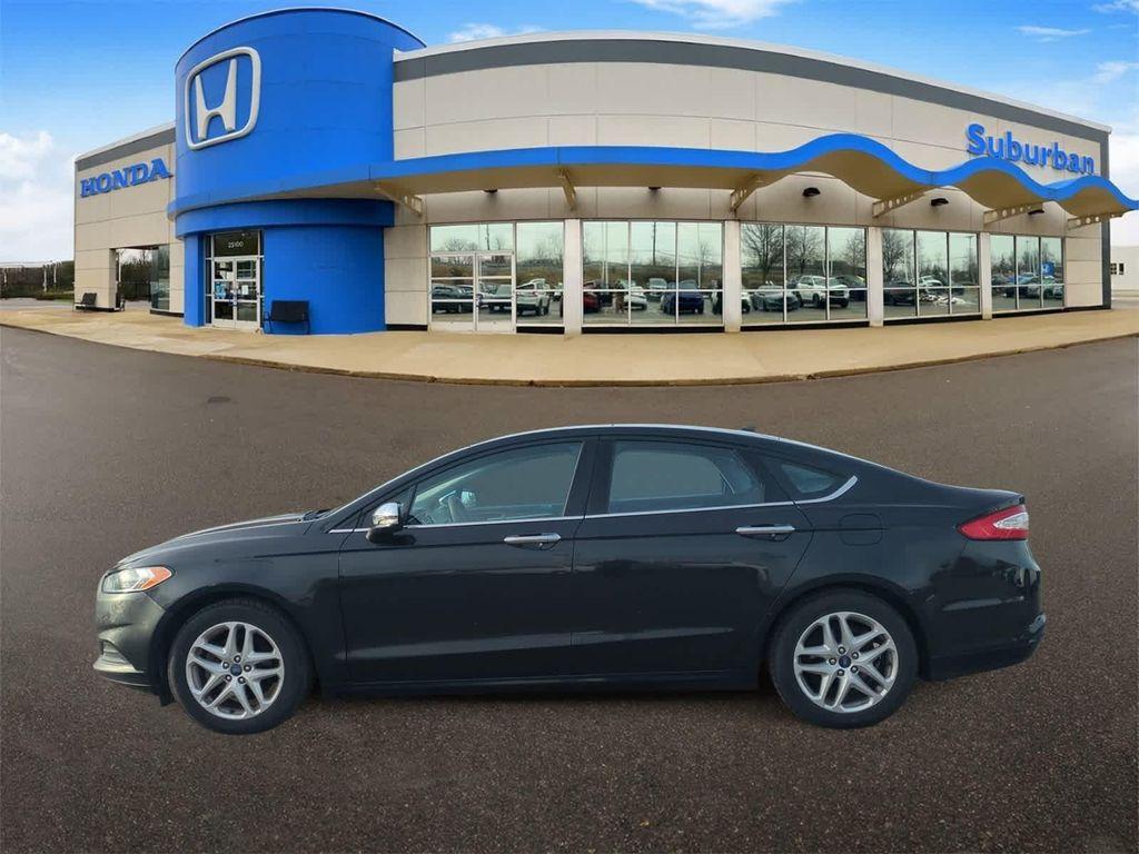 used 2014 Ford Fusion car, priced at $6,997