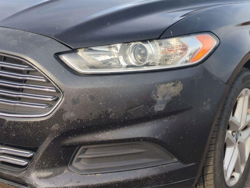 used 2014 Ford Fusion car, priced at $6,997