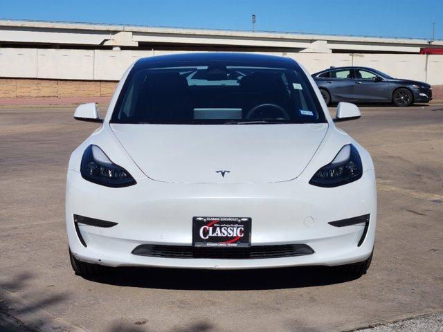 used 2022 Tesla Model 3 car, priced at $27,492