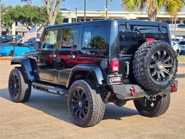 used 2013 Jeep Wrangler Unlimited car, priced at $22,894