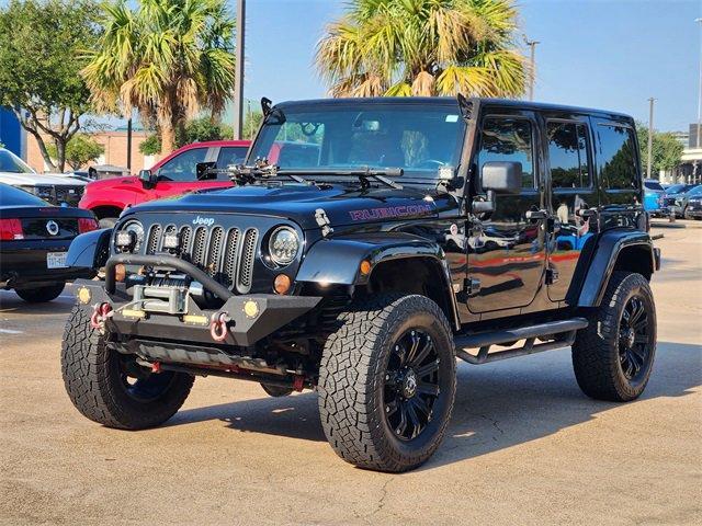 used 2013 Jeep Wrangler Unlimited car, priced at $22,894