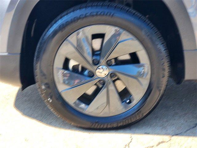 used 2025 Volkswagen Taos car, priced at $23,492