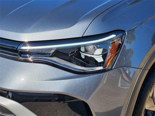 used 2025 Volkswagen Taos car, priced at $22,483