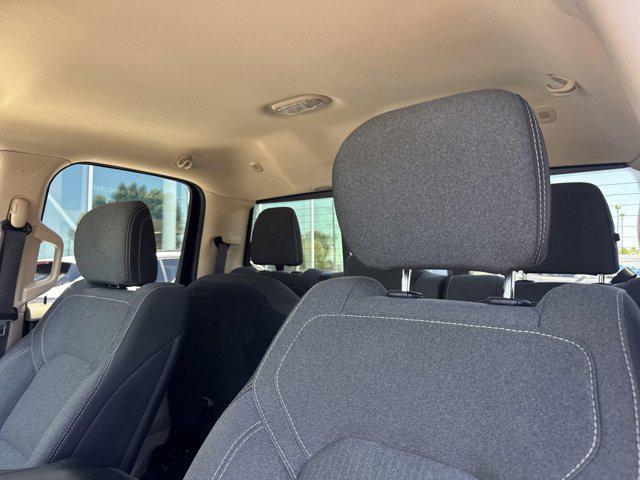 used 2019 Ram 1500 car, priced at $25,000