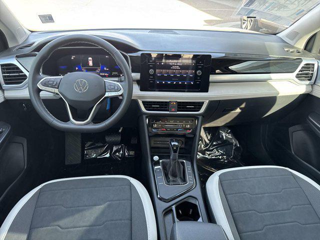 new 2025 Volkswagen Taos car, priced at $31,708