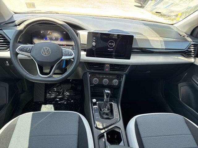 new 2025 Volkswagen Taos car, priced at $27,046