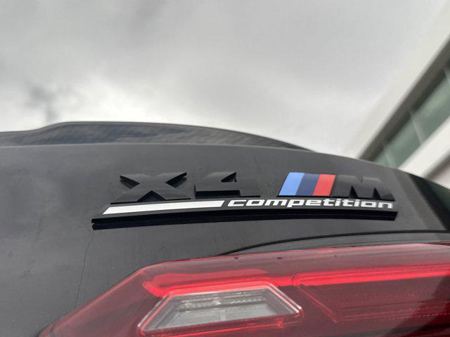 used 2021 BMW X4 M car, priced at $56,000