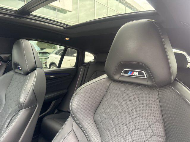 used 2021 BMW X4 M car, priced at $56,000