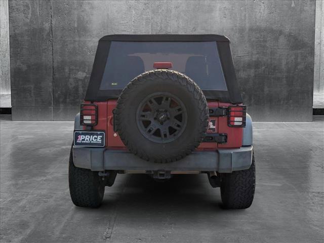 used 2011 Jeep Wrangler Unlimited car, priced at $15,498