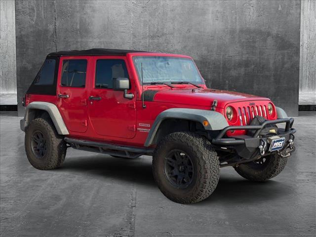 used 2011 Jeep Wrangler Unlimited car, priced at $15,498