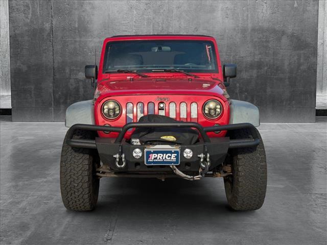 used 2011 Jeep Wrangler Unlimited car, priced at $15,498