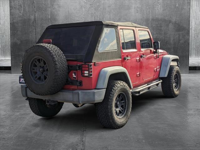 used 2011 Jeep Wrangler Unlimited car, priced at $15,498