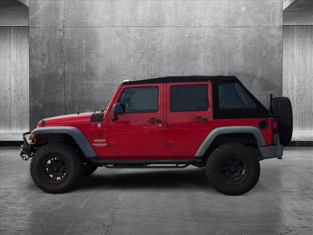 used 2011 Jeep Wrangler Unlimited car, priced at $15,498