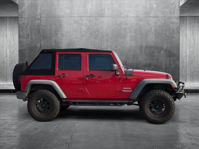 used 2011 Jeep Wrangler Unlimited car, priced at $15,498