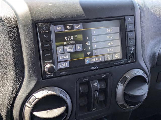 used 2014 Jeep Wrangler Unlimited car, priced at $13,495
