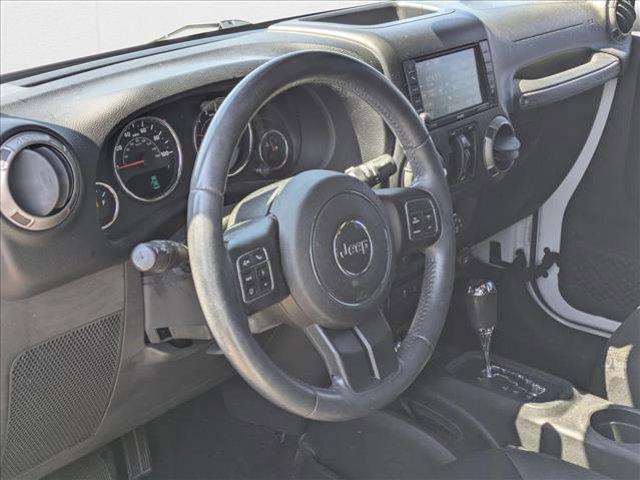 used 2014 Jeep Wrangler Unlimited car, priced at $13,495