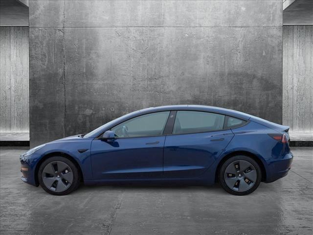 used 2023 Tesla Model 3 car, priced at $27,495