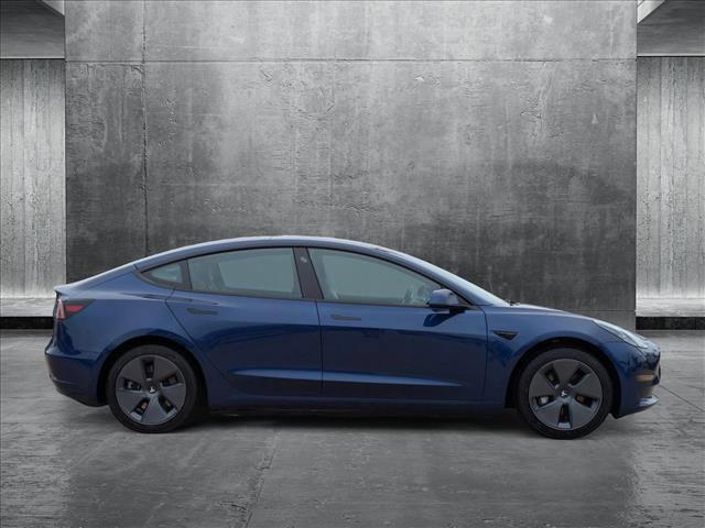 used 2023 Tesla Model 3 car, priced at $27,495