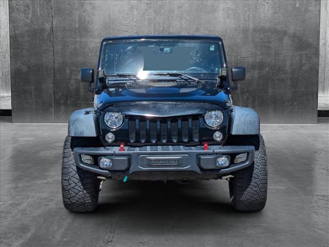 used 2014 Jeep Wrangler Unlimited car, priced at $17,495