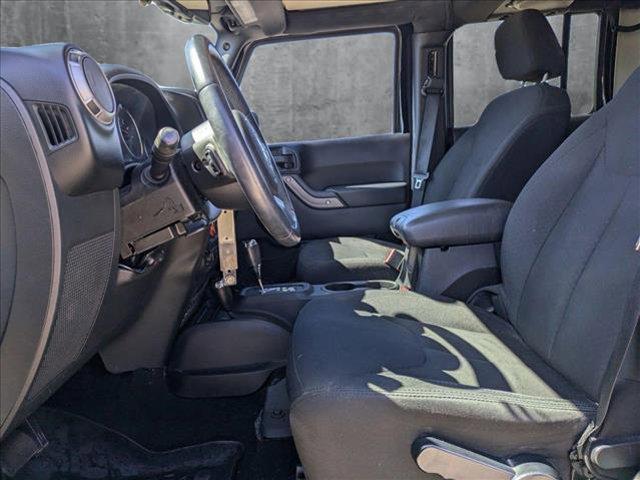 used 2014 Jeep Wrangler Unlimited car, priced at $17,495