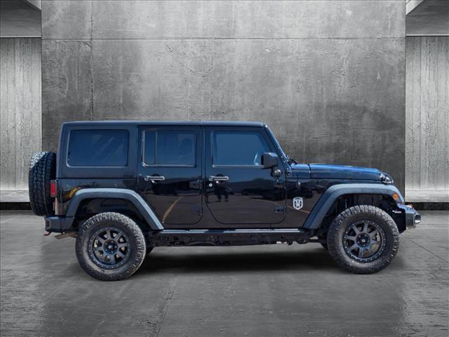 used 2014 Jeep Wrangler Unlimited car, priced at $17,495