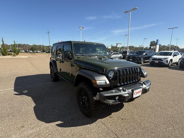 used 2021 Jeep Wrangler Unlimited car, priced at $31,556