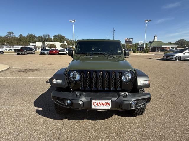 used 2021 Jeep Wrangler Unlimited car, priced at $31,556