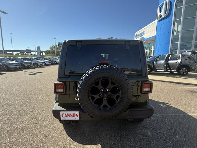 used 2021 Jeep Wrangler Unlimited car, priced at $31,556