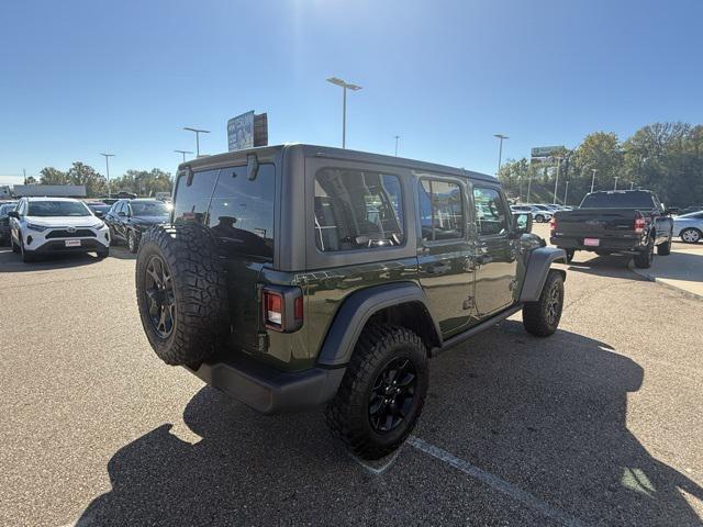 used 2021 Jeep Wrangler Unlimited car, priced at $31,556