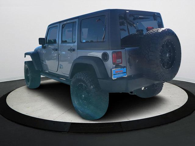 used 2016 Jeep Wrangler Unlimited car, priced at $21,940