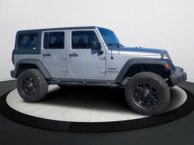 used 2016 Jeep Wrangler Unlimited car, priced at $21,940