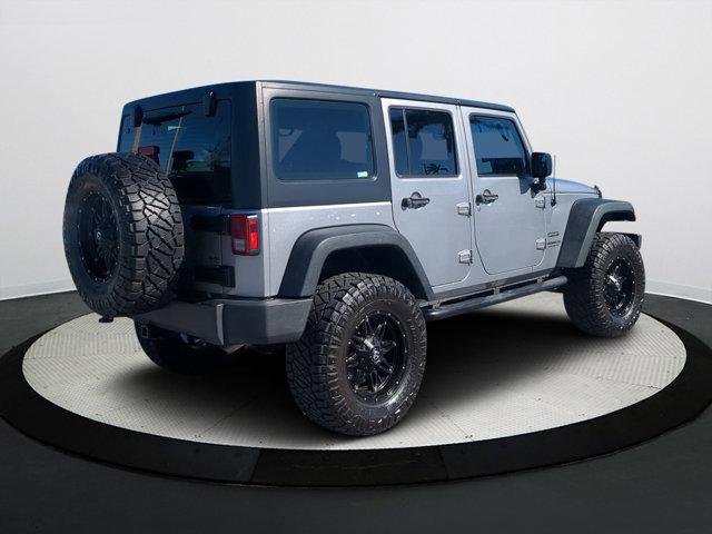 used 2016 Jeep Wrangler Unlimited car, priced at $21,940