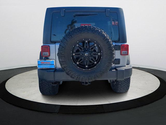 used 2016 Jeep Wrangler Unlimited car, priced at $21,940