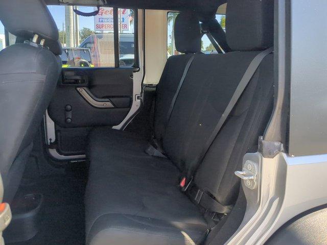 used 2016 Jeep Wrangler Unlimited car, priced at $21,940