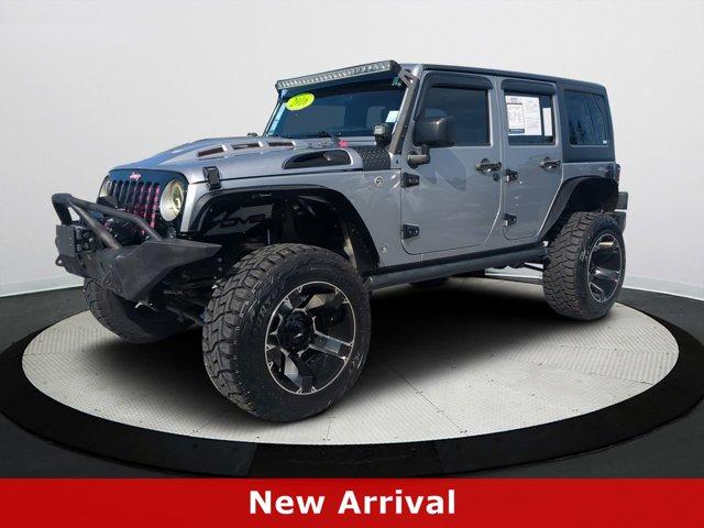 used 2016 Jeep Wrangler Unlimited car, priced at $19,516