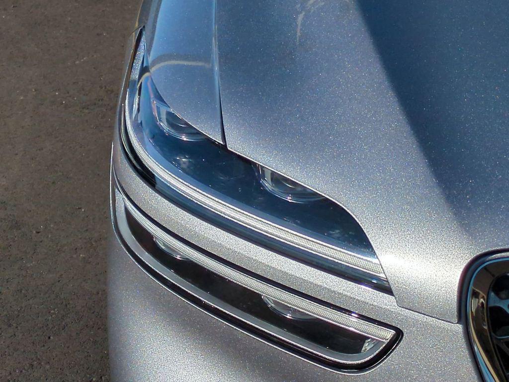 used 2023 Genesis GV70 car, priced at $38,124