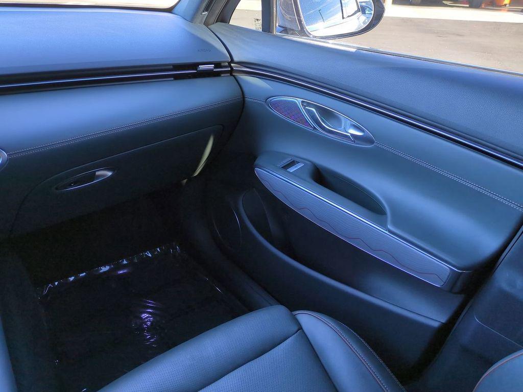 used 2023 Genesis GV70 car, priced at $38,124