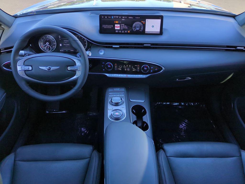 used 2023 Genesis GV70 car, priced at $38,124