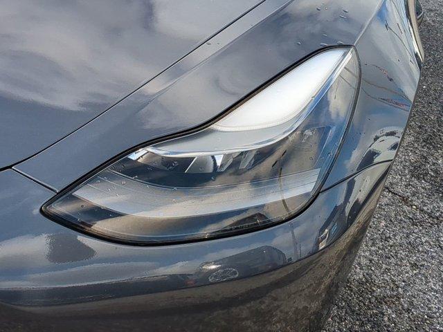 used 2023 Tesla Model 3 car, priced at $30,991