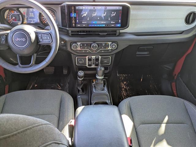 used 2024 Jeep Wrangler car, priced at $31,295